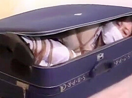 Girl Bound and Gagged in Suitcase
