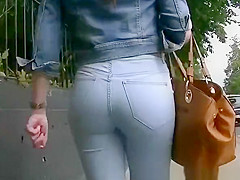 Girl in tight jeans pants and jacket