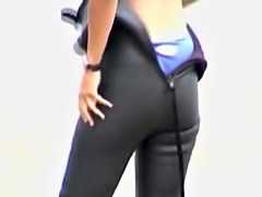 Girl is clothing her candid booty into the spandex costume 07las01