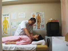Girl lying on back letting man look inside pussy on