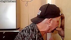 Gloryhole cum loving DILF sucks rod in homemade video