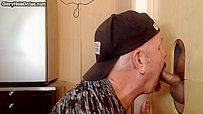 Gloryhole cum loving DILF sucks rod in homemade video