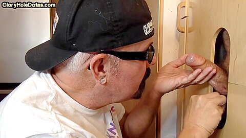 Gloryhole homemade DILF sucks and wanks BFs cock at home