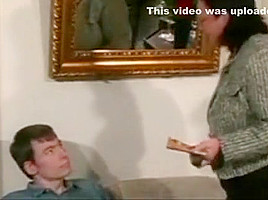 Granny Spanks and Straps the Boy