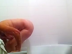 Granny spied in bath tub