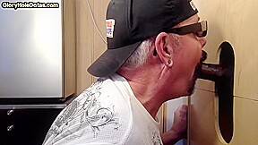 Gray gaydaddy sucking and wanking gloryhole black cock
