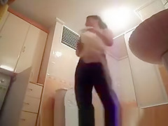 Hot busty woman undressing before shower