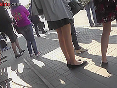 Hot gal with auburn hair wears thong in upskirt porn