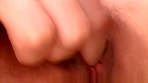 Hot oriental MILF puts vibrating toy in her moist pussy
