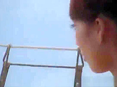 Japanese model is an amateur sucking cock outdoors