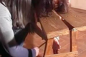 Kinky brunette gets her butt flogged on the bench