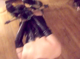 Latex Fastened Tranny and Cum Guzlling