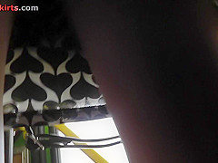 Long-haired beauty in the bus upskirt amateur movie