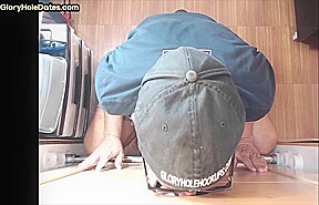 Mature DILF deepthroats and slurps on gloryhole dong