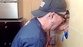 Mature DILF deepthroats and slurps on gloryhole dong