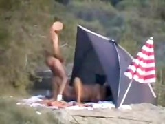 Mature pervert bitch at the beach 2