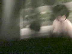 Naked Asian sitting back to the cam in shower room nri039 00