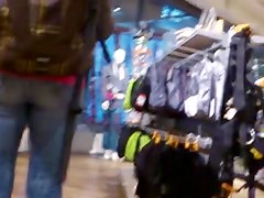 Nice fanny in blue jeans caught in a street candid clip