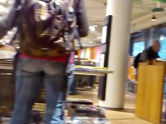 Nice fanny in blue jeans caught in a street candid clip