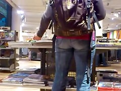 Nice fanny in blue jeans caught in a street candid clip