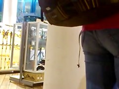 Nice fanny in blue jeans caught in a street candid clip