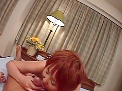 Nympho Japanese teasing loaded cock with her mouth