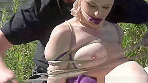 Outdoor bondage and cloth gagging of dominated submissive Caroline Pierce