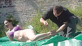 Outdoor bondage and cloth gagging of dominated submissive Caroline Pierce
