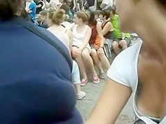 Peer down her shirt in public for a nipple