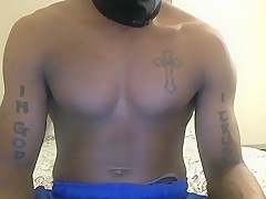 Playing in his blue mesh shorts