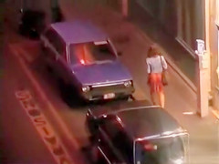 Pretty woman in a dress pisses in public
