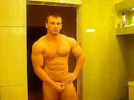 RUSSIAN BODYBUILDER STRIP AND CUM