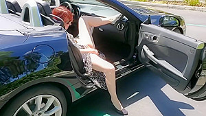 Redhead MILF fucking herself in public parking lot and trails