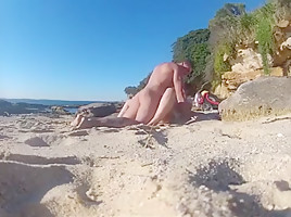 Secretly fucking my wife at the nude beach