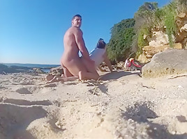 Secretly fucking my wife at the nude beach