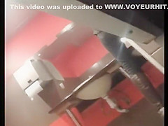 Secretly watching a college girl pee