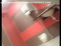 Secretly watching a college girl pee