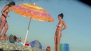 Sexy Beach Nudist Women Putting On Lotion Caught By