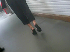 Sexy Brunette In Wedges High Heels