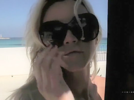 Sexy blonde dancing on the beach