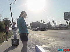 Sexy blonde gal shows off g-string in candid upskirts