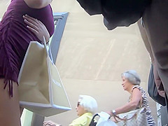 Sexy woman goes commando under skirt