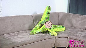 Spineless Lady In Shiny Green Catsuit - Watch4Fetish