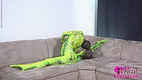 Spineless Lady In Shiny Green Catsuit - Watch4Fetish
