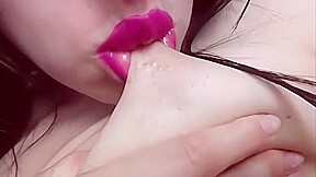 Spitting on my massive nipples and then sucking them (closeup)