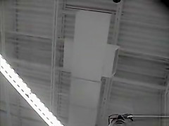 Spying up a milf skirt on a shopping trip