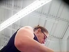 Spying up a milf skirt on a shopping trip