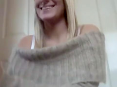 Sweater dress uppie shows her white cotton panties