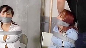 Two damsels tape bondage