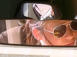 Two girls licking pussies in the car